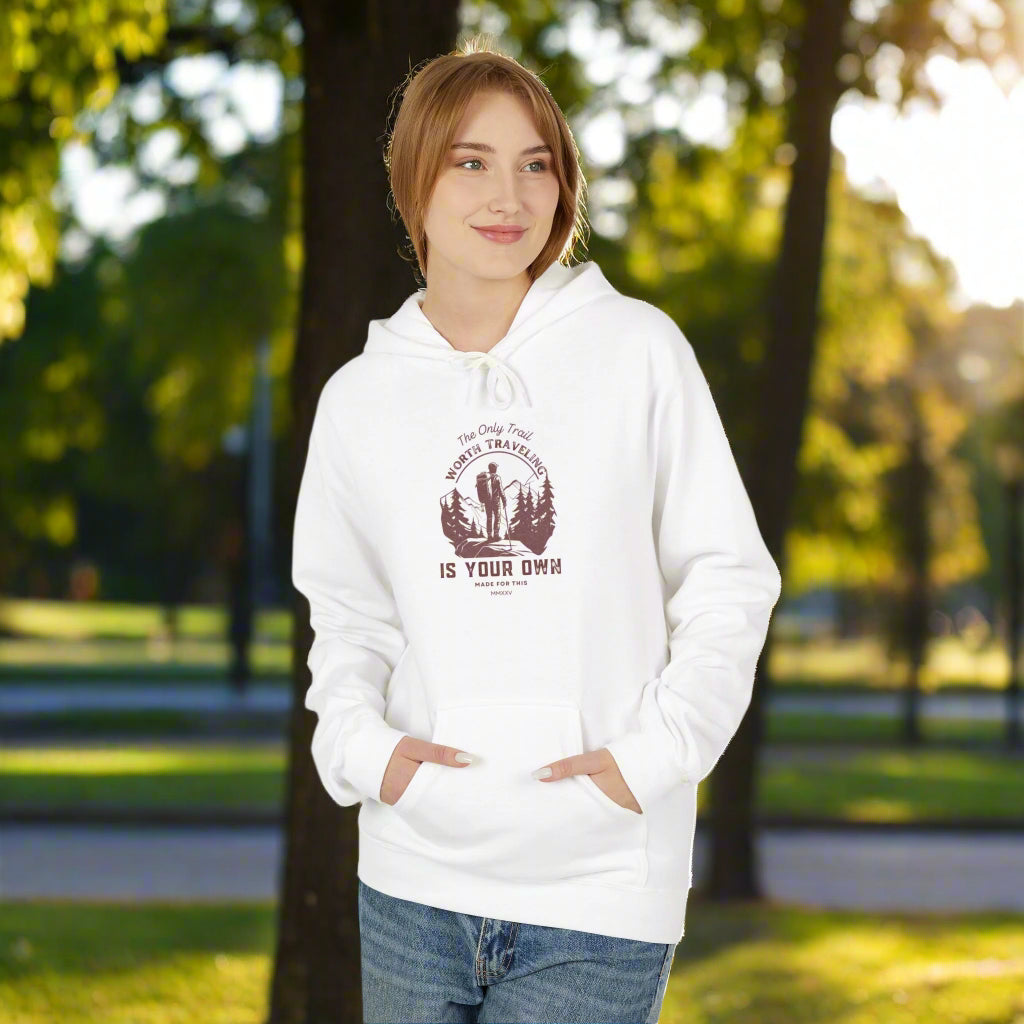 Person wearing a white hoodie with a graphic design